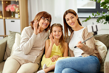 Image showing mother, daughter and grandmother taking selfie