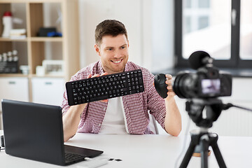 Image showing video blogger with keyboard and computer mouse