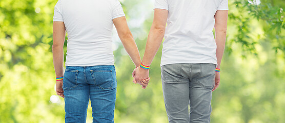 Image showing male couple with gay pride rainbow wristbands