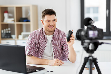 Image showing video blogger with computer mouse videoblogging