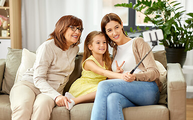 Image showing mother, daughter and grandmother taking selfie