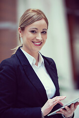 Image showing business woman working on tablet