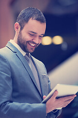 Image showing business man with tablet