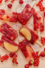 Image showing Homemade frozen various red berries natural juice popsicles - paletas - ice pops