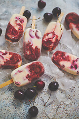Image showing Homemade Delicious Vegan Cherry Popsicles with Coconut Milk. Summer healthy food concept