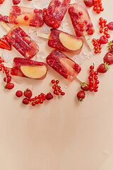 Image showing Homemade frozen various red berries natural juice popsicles - paletas - ice pops