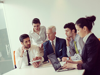 Image showing business people group on meeting at modern startup office