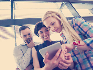 Image showing group of Business People Working With Tablet in startup office