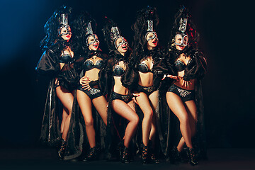 Image showing young beautiful dancers posing on studio background