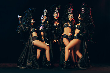 Image showing young beautiful dancers posing on studio background