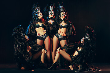 Image showing young beautiful dancers posing on studio background