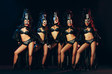 Image showing young beautiful dancers posing on studio background