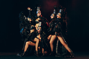 Image showing young beautiful dancers posing on studio background