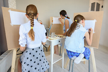 Image showing group of people draw still life on easels