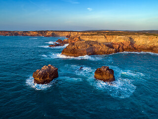 Image showing Aerial view on rock cliffs and waves