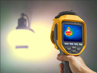 Image showing Recording whit Thermal camera, Lighted classic lamp on the wall