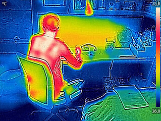 Image showing Thermal image Young Girl using laptop on a home