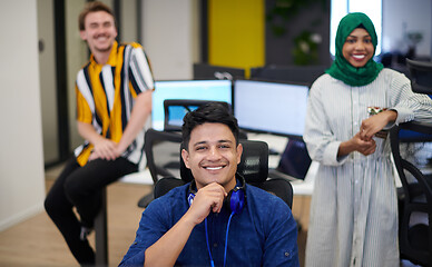 Image showing Multiethnic startup business team with Arabian woman