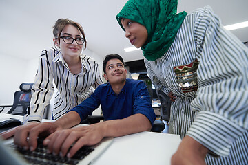 Image showing Multiethnic startup business team with Arabian woman