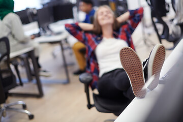 Image showing business woman taking a break from work