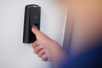 Image showing man pressing fingerprint scanner