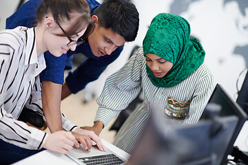 Image showing Multiethnic startup business team with Arabian woman