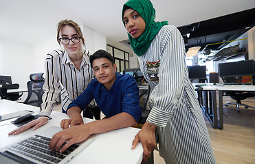 Image showing Multiethnic startup business team with Arabian woman