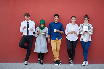 Image showing multiethnic group of casual business people during coffee break