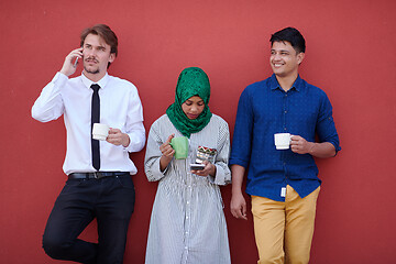 Image showing multiethnic group of casual business people during coffee break