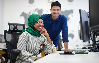 Image showing Multiethnic startup business team with Arabian woman