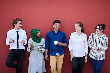 Image showing multiethnic group of casual business people during coffee break