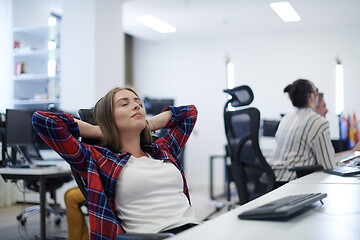 Image showing casual business woman taking a break from work