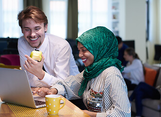 Image showing international multicultural business team working together on la