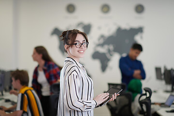 Image showing portrait of businesswoman holding tablet computer