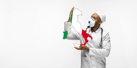 Image showing Beautiful african-american doctor cares about Italy isolated over white studio background