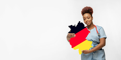 Image showing Beautiful african-american doctor cares about Germany isolated over white studio background