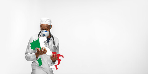 Image showing Beautiful african-american doctor cares about Italy isolated over white studio background