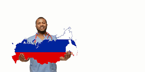 Image showing Beautiful african-american doctor cares about Russia isolated over white studio background