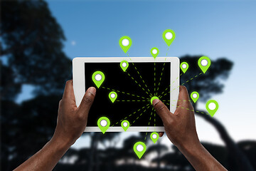 Image showing Food and goods purchase via the Internet. Your smartphone or other gadget - all you need for food arriving to any address