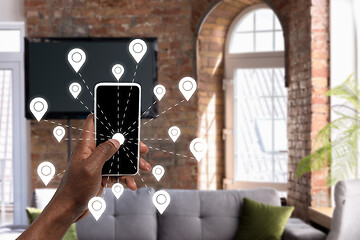 Image showing Food and goods purchase via the Internet. Your smartphone or other gadget - all you need for food arriving to any address