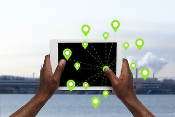 Image showing Food and goods purchase via the Internet. Your smartphone or other gadget - all you need for food arriving to any address