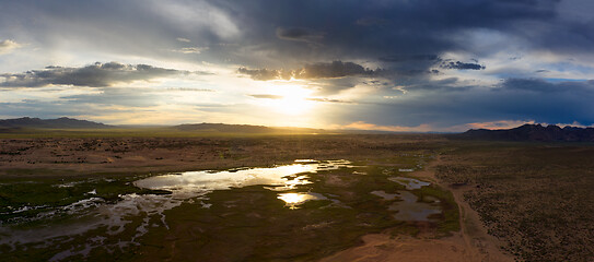 Image showing Sand dunes Bayan Gobi and lake at sunset