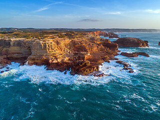 Image showing Aerial view on rock cliffs and waves