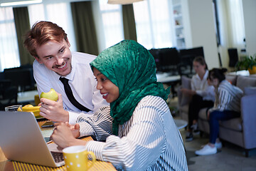 Image showing international multicultural business team working together on la