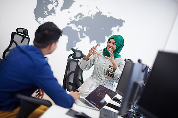 Image showing Multiethnic startup business team with Arabian woman