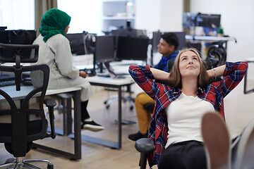 Image showing business woman taking a break from work