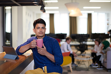 Image showing casual indian business man taking break from the work