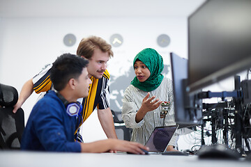 Image showing Multiethnic startup business team with Arabian woman