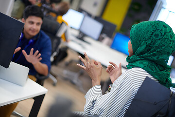 Image showing Multiethnic startup business team with Arabian woman