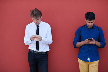 Image showing multiethnic startup business men using mobile phone